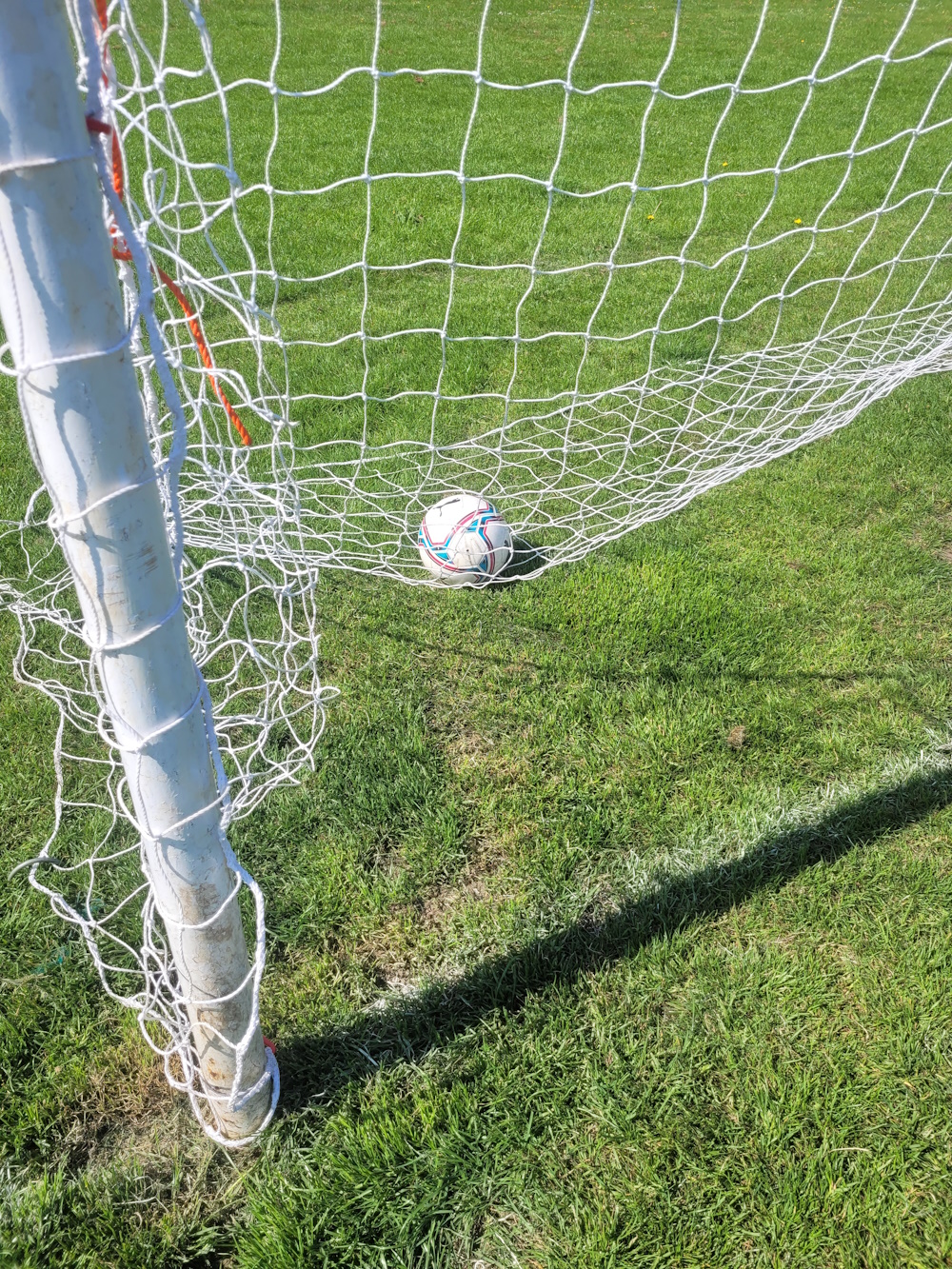 Football net with ball in